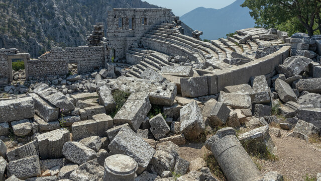 The amphitheater was built in the II century BC according to the classical Roman principle. Amphitheater in the ancient city of Termessos in Turkey. The amphitheater is high in the mountains.
