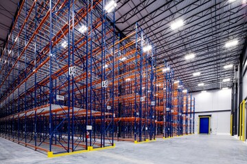 Interior of modern warehouse with empty racking system design for cold storage