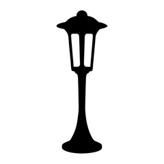 Silhouette of a classic and decorative street lamp for public illumination