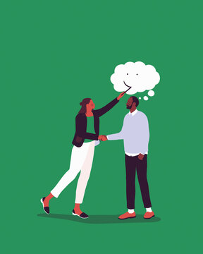 Woman drawing smiley face on thought bubble of man shaking hands