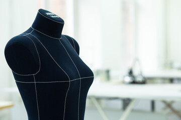 Close-up photo of a mannequin in a bright workshop