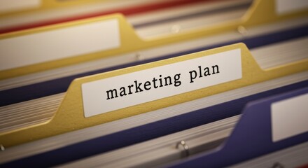 Organized business: close-up of file folders with 'marketing plan' label