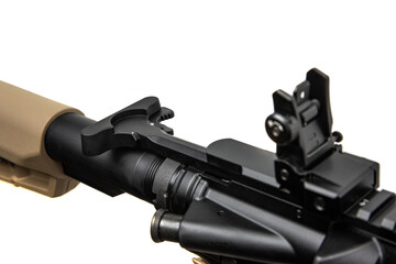 A modern sporting rifle in black and tan, featuring an adjustable stock and foregrip, isolated on a white back
