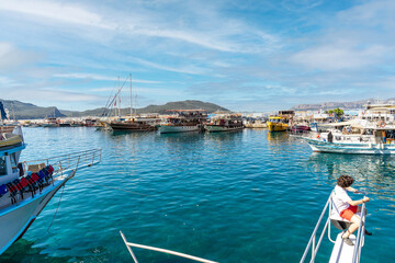 A small, nostalgic harbor in Kaş where tour and fishing boats dock. Kaş is one of the most well-known and beautiful tourist destinations in the Mediterranean. Antalya - Turkey