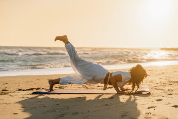 Yoga strength balance sunrise beach
