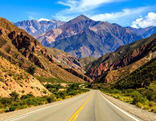 Naklejka premium Scenic mountain road winding through colorful peaks