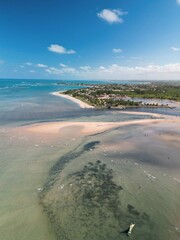 Aerial view of Pontal de Maracaípe in Porto de Galinhas, Brazil, with crystal clear sea, natural...
