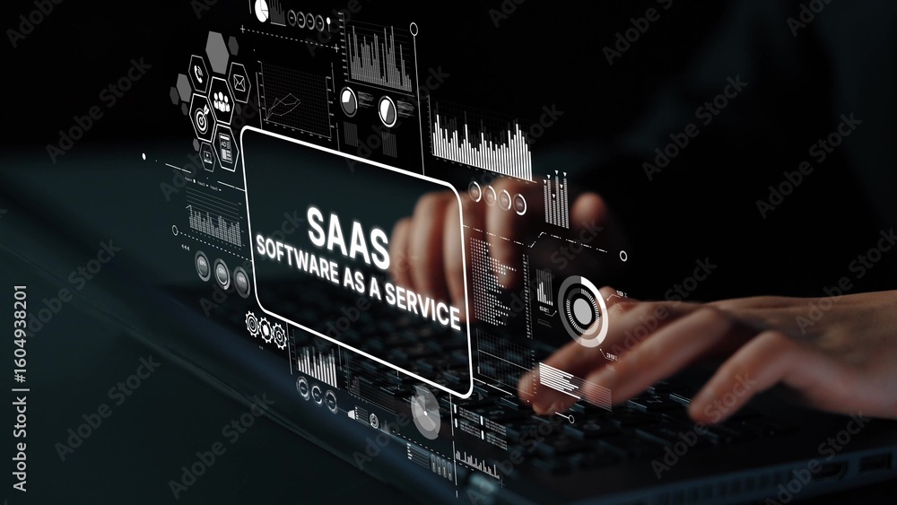 Poster hands typing on laptop with digital overlay of software as a service concept for technology and busi