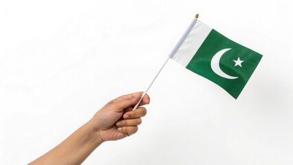 Celebrating Pakistan Waving a miniature flag embodying patriotism and national pride on Independence
