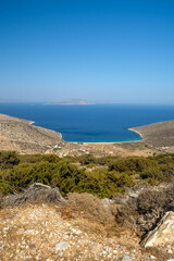 View of a stunning panoramic view of the turquoise sandy Agia Theodoti beach in Ios Greece