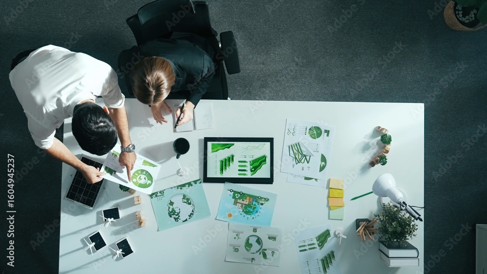 Poster top down view of business man presenting sustainable idea to manager by using tablet display esg env