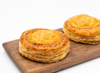 Golden Creamy Mushroom Puffs on Wooden Board side view of Savory Puff Pastry