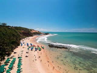 Aerial view of Praia da Pipa and Chapad&atilde;o cliffs in Pipa, Rio Grande do Norte, Brazil, showing paradise beaches, blue sea, and dramatic coastline &ndash; perfect summer destination