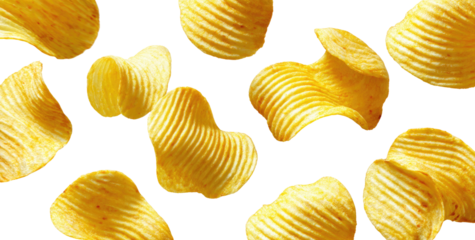 Crispy potato chips scattered on black