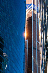 MOSCOW. RUSSIA - JULE 4, 2022:The Skyscrapers of the Moscow City International Business Center and lights of a sun