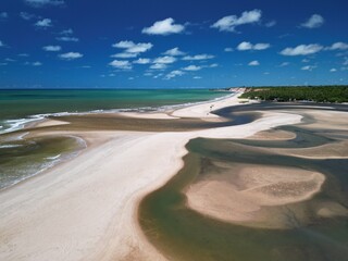 Aerial view of Jo&atilde;o Pessoa beach, Para&iacute;ba, Brazil &ndash; fishing village, river meeting the sea, coastline, and nature in South America

