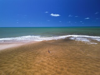 Aerial view of Jo&atilde;o Pessoa beach, Para&iacute;ba, Brazil &ndash; fishing village, river meeting the sea, coastline, and nature in South America


