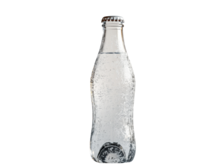 Close-up of a glass bottle filled with carbonated water.