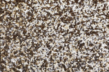 Gold and silver sequin fabric with large paillettes. Slick shine ideal for fashion, party styling, textiles, sparkle couture, dancewear, fashion, sewing, fashion design and festive glam backgrounds.