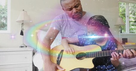 father guiding daughter strumming acoustic guitar, pastel lights swirling during music education - Powered by Adobe