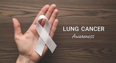 Lung Cancer Awareness White Ribbon in Hand