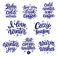 Winter quotes set. Hand lettering blue texts with snowflakes isolated on white background. Vector typography for winter holidays posters, banners, greeting cards, home decor, mugs, clothes