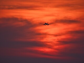 airplane flying in a beautiful sunset, Hannover