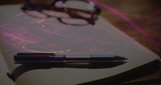 Animated orange and pink light streaks emerging left edge across paper toward pen energizing scene