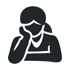 Silhouette of female student sitting with head on hand