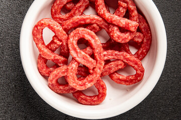 Salami snack mold brezel sausage mini fresh delicious gourmet food background on the table rustic food top view copy space