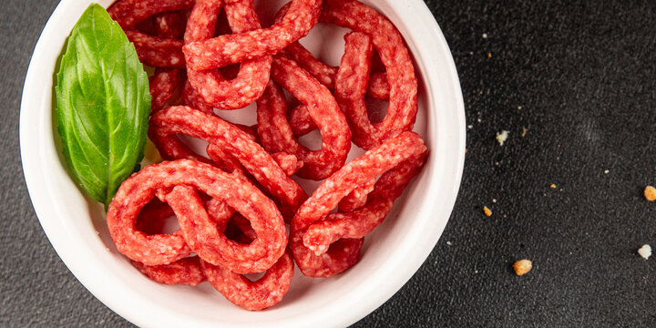 Salami snack mold brezel sausage mini fresh delicious gourmet food background on the table rustic food top view copy space