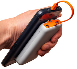 A hand holds a smartphone connected to a portable power bank, a simple charging setup.