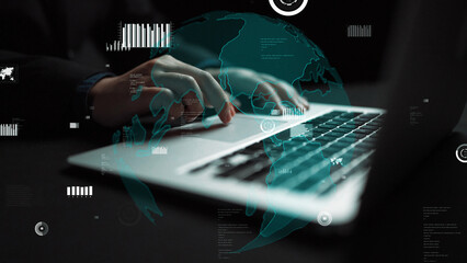 A focused professional hands engaged in typing on a laptop, surrounded by a stunning global digital interface showcasing data and various analytical graphics. Xenic