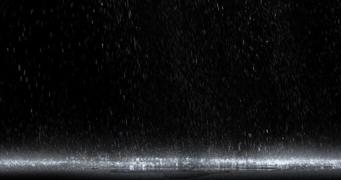 4k Rain over black background, realistic rain can be use in your composition, Rain hits the ground effect, Splashing rain