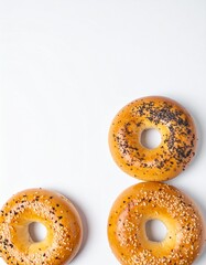 Delicious golden bagels topped with sesame and poppy seeds ready to enjoy for breakfast
