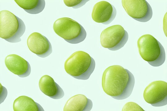 Green lima bean seamless pattern with crisp shadows on a light green background. Food theme for wallpaper.