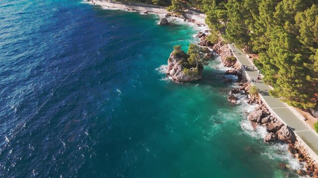 Iconic Brela Stone with Windy Adriatic Waters &ndash; 4K Aerial Video