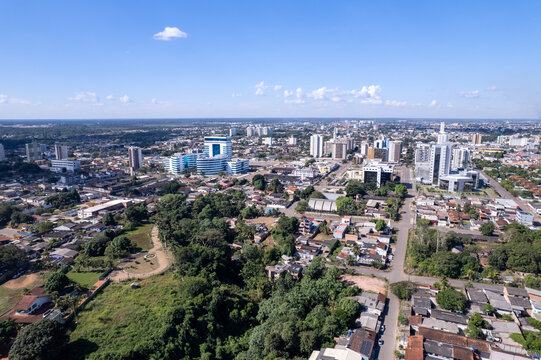 Beautiful aerial drone view of Porto Velho city center streets, buildings and houses in the Amazon rainforest on sunny summer day. Rondonia state, Brazil.