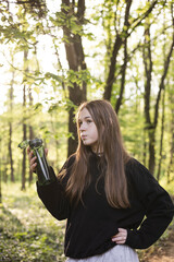 Teenager girl are drinking water from bottle. A girl drinks water after a run.