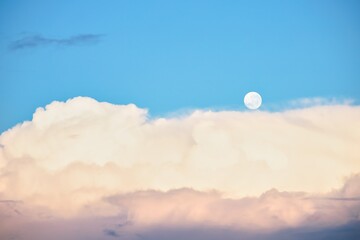 Sky replacement of New Zealand clean blue sky, white clouds and the moon.