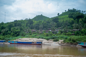 Misty Mountains and Town at Dusk in Laos