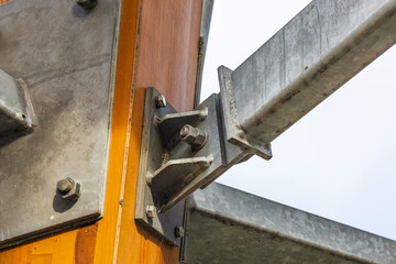 Timber and steel bracket connection showcasing modern hybrid construction detail