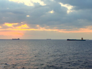 cargo ship at sunset