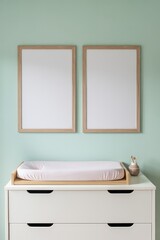 Minimal Changing Table with Two Poster Frames

