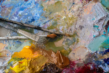 Painter's palette with oil paint.