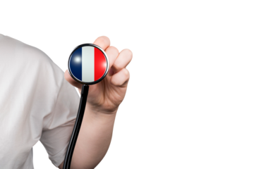 The head of a medical stethoscope in the shape of the French flag in a hand (close-up) on a transparent background. French healthcare system concept