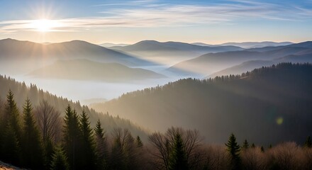 Obraz premium Mountain range bathed in the golden light of sunrise.