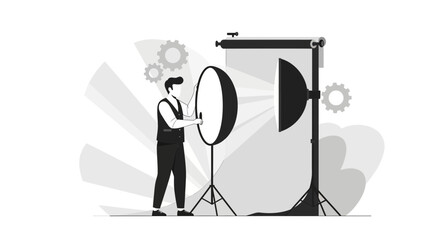 Photographer Setting Up The Lighting For Professional Studio Photoshoot