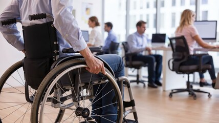 Inclusive workplace with disabled employee in wheelchair working in modern office environment with colleagues.