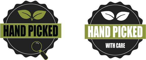 Two hand picked labels with leaves and text in black and green on a white isolated background